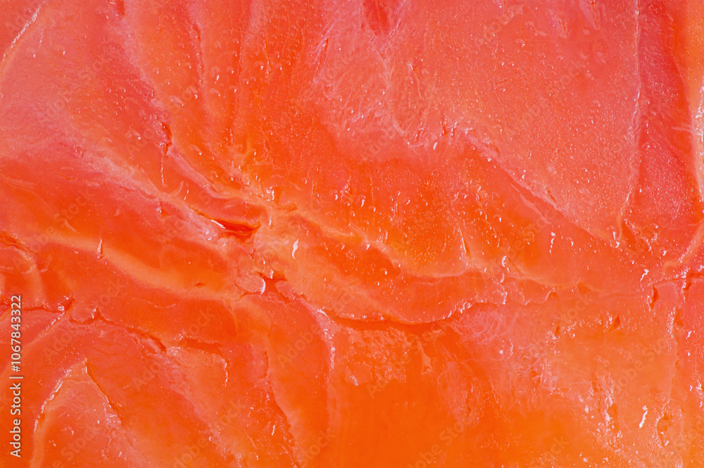 Fototapeta premium Red salmon fish fillet macro photo as background. Texture of fish fillet.
