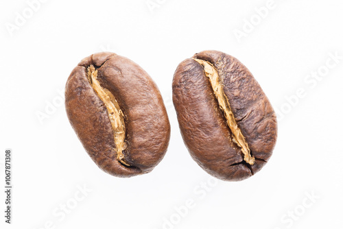 Two Roasted Coffee Beans Closeup Isolated White photo