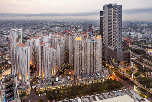 View of modern building skyscrapers and futuristic architecture with sunset scene