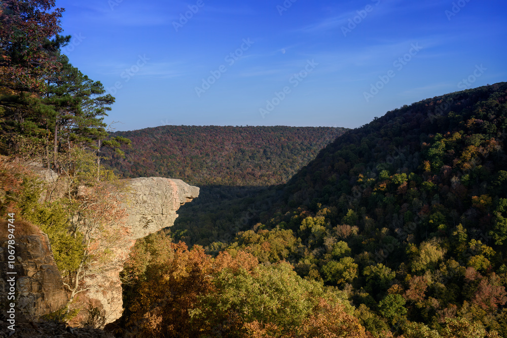 The breathtaking view from Whitaker Point (Hawksbill Crag) in Arkansas' Ozark National Forest, framed by the vibrant colors of fall The breathtaking view from Whitaker Point (Hawksbill Crag) in Arkansas' Ozark National Forest, framed by the vibrant colors of fall