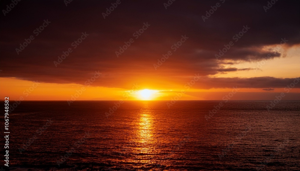 Fototapeta premium A big sun rises under the dark sky