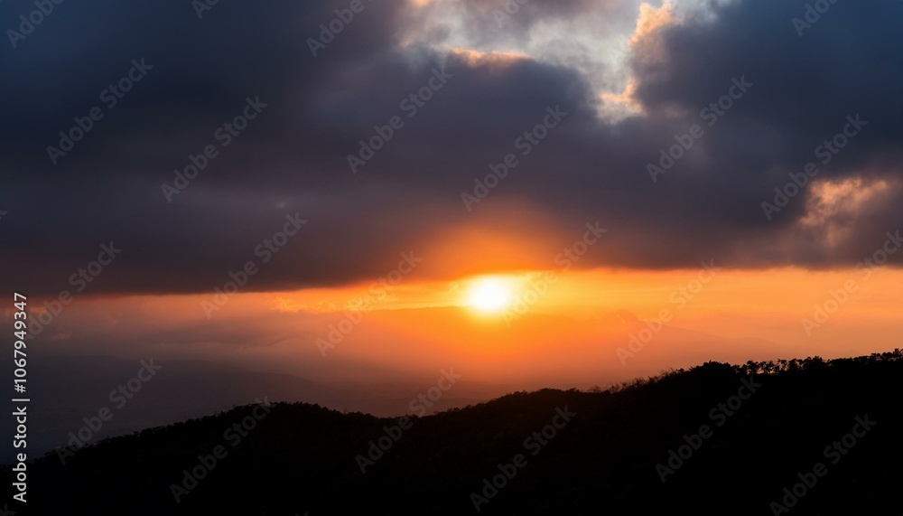 A big sun rises under the dark sky A big sun rises under the dark sky