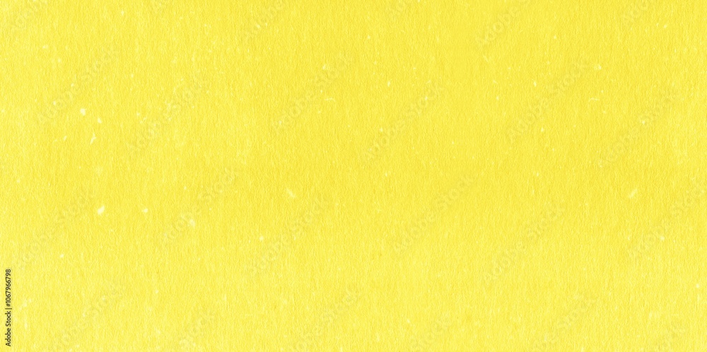 Solid yellow textured background with a subtle grain, ideal for design and creative projects. Solid yellow textured background with a subtle grain, ideal for design and creative projects.