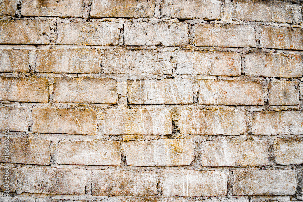 Brown white house brick wall surface texture background weathered bricks, cement joints, and old aged, grungy appearance. Ideal for urban, vintage design. Focus on wall, noisy, similar others Brown white house brick wall surface texture background weathered bricks, cement joints, and old aged, grungy appearance. Ideal for urban, vintage design. Focus on wall, noisy, similar others