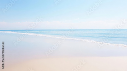 serene beach scene with gentle waves and clear blue skies