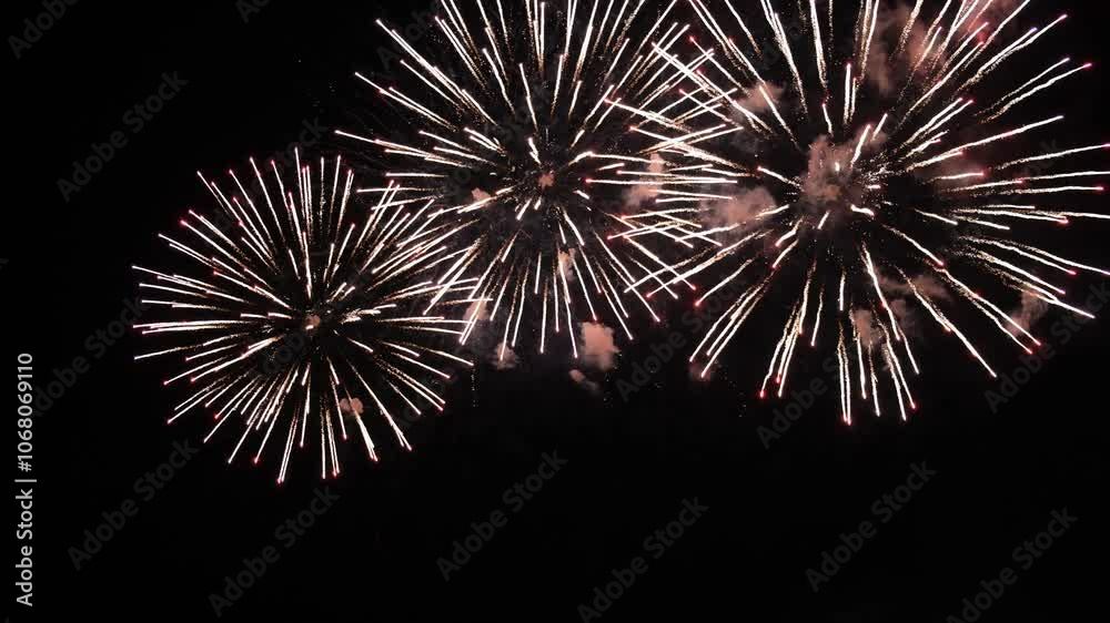 4K colorful fireworks in the night sky. Colorful pyrotechnic show right above your head. Magic and fairy tale on new year's eve. Festival, wedding, Happy Birthday, Christmas, Diwali, New year