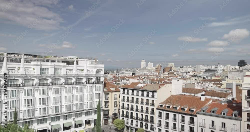 Beautiful slow motion shot in general shot of Madrid city center during the day with classic and recognizable buildings of the city for tourists. Beautiful slow motion shot in general shot of Madrid city center during the day with classic and recognizable buildings of the city for tourists.