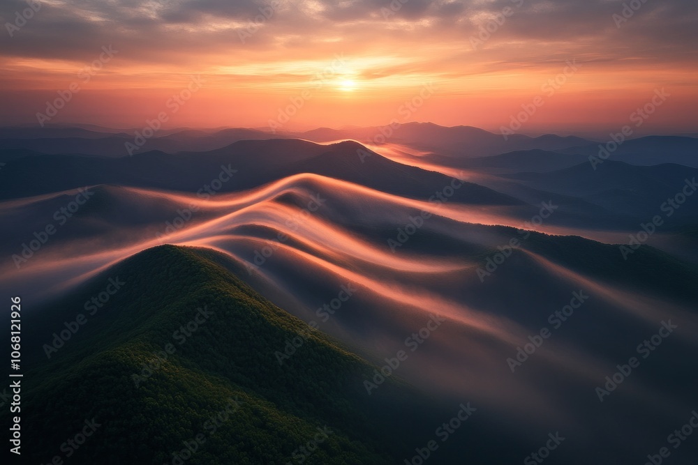 Sunrise over the misty mountains of a national park. The landscape is dotted with lush green hills and rolling clouds. Sunrise over the misty mountains of a national park. The landscape is dotted with lush green hills and rolling clouds.