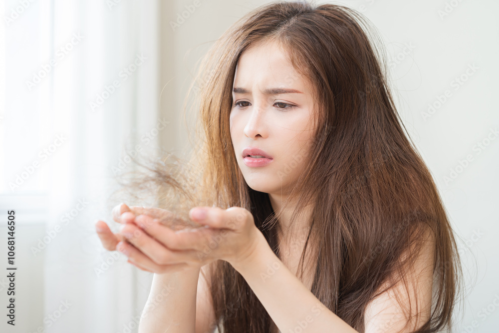 Serious, worried asian young woman, girl holding, show damaged loss hair, problem after brushing, hair fall out on hand. Health care of beauty treatment. Portrait isolated on background, copy space. Serious, worried asian young woman, girl holding, show damaged loss hair, problem after brushing, hair fall out on hand. Health care of beauty treatment. Portrait isolated on background, copy space.
