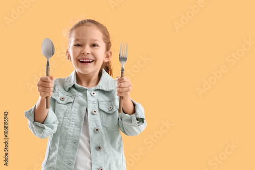Cute little girl with fork ...