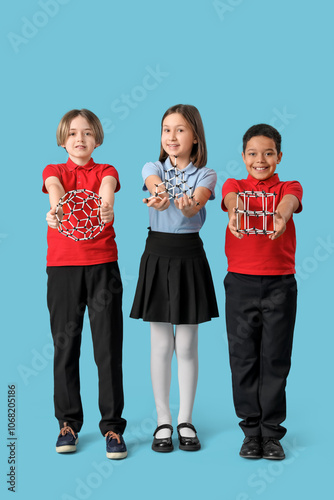 Cute children in school uni...