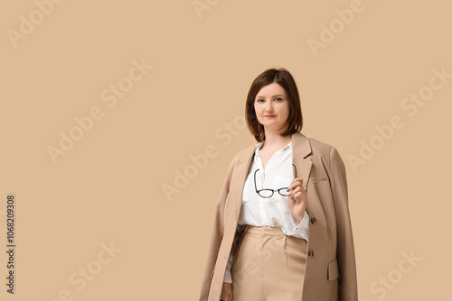 Confident businesswoman hol...