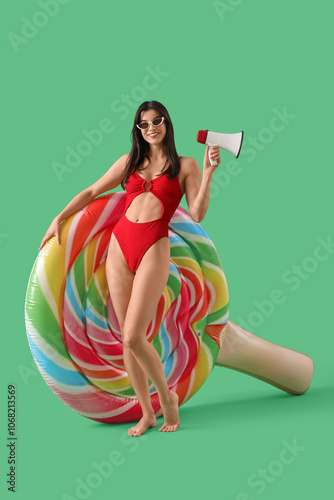 Young woman in red swimsuit...