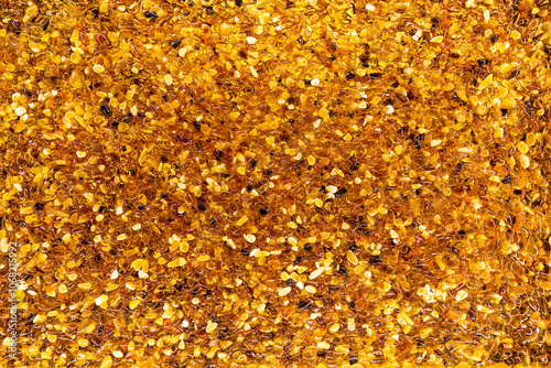 A scattering of small processed amber stones.