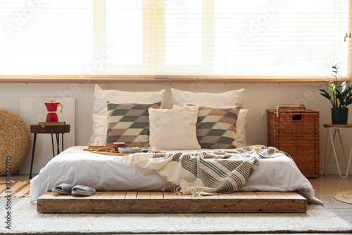 Interior of light bedroom w...