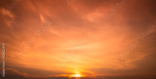 Beautiful golden Sky, Sunset sky clouds in the Evening with Orange, Yellow, Horizon nature Golden hour sky backgrounds, luxury soft gradient orange gold clouds and sunlight on the sky 