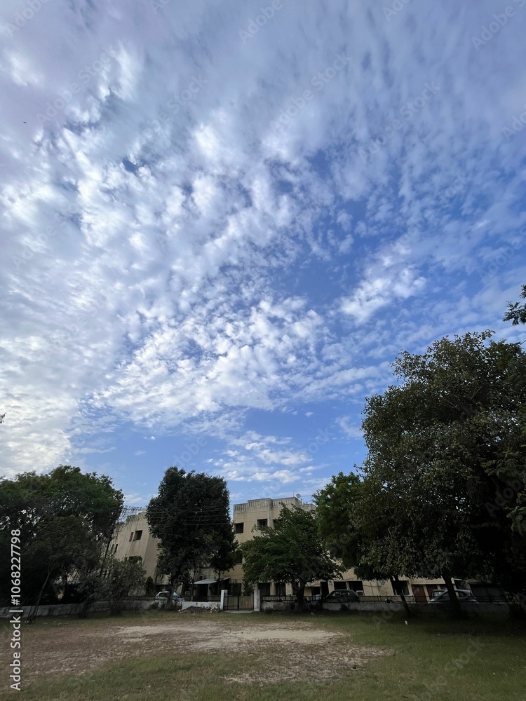 Historic buildings under a vibrant blue sky with clouds Historic buildings under a vibrant blue sky with clouds
