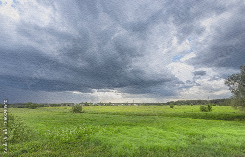 A cloudy sky with a field of grass in the background