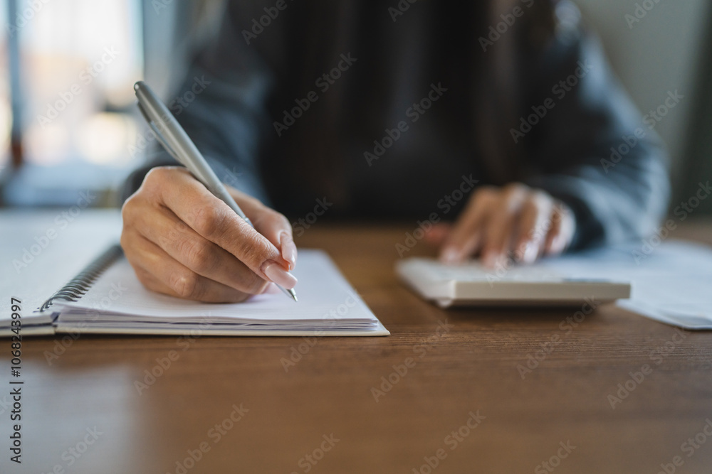 woman sit at desk at home manage household expenses expenditures woman sit at desk at home manage household expenses expenditures