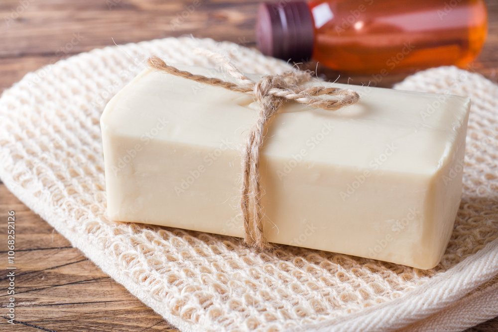 Spa and Wellness concept on wooden background. Soap and massage brush and oil. Spa and Wellness concept on wooden background. Soap and massage brush and oil.
