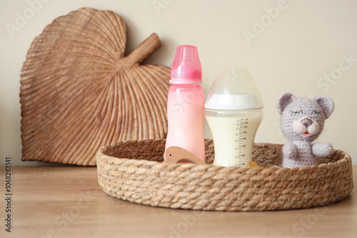 Wicker tray with bottles of...