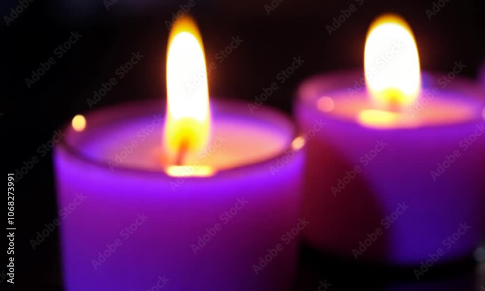 five burning candles on the table (purple) five burning candles on the table (purple)