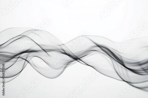 Wispy clouds stretching across a pale sky