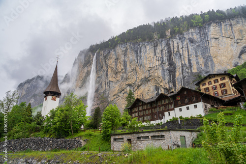 Lauterbrunnen, Village in Switzerland, in the Swiss Alps, Beautiful Valley with rocky cliffs and Waterfalls, Known as the Land of 72 Waterfalls photo