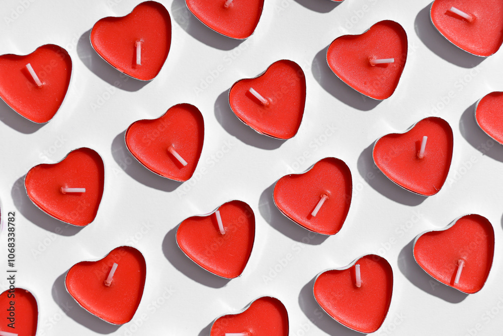 Candles in shape of heart on grey background. Valentine's Day celebration Candles in shape of heart on grey background. Valentine's Day celebration