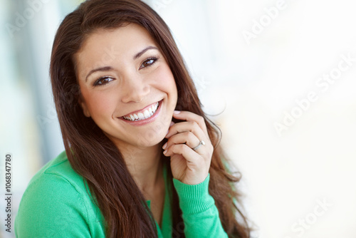 Portrait, relax and smile with woman in living room of home for wellness on weekend. Break, confident and morning with face of happy person sitting on sofa in apartment for calm, peace or quiet