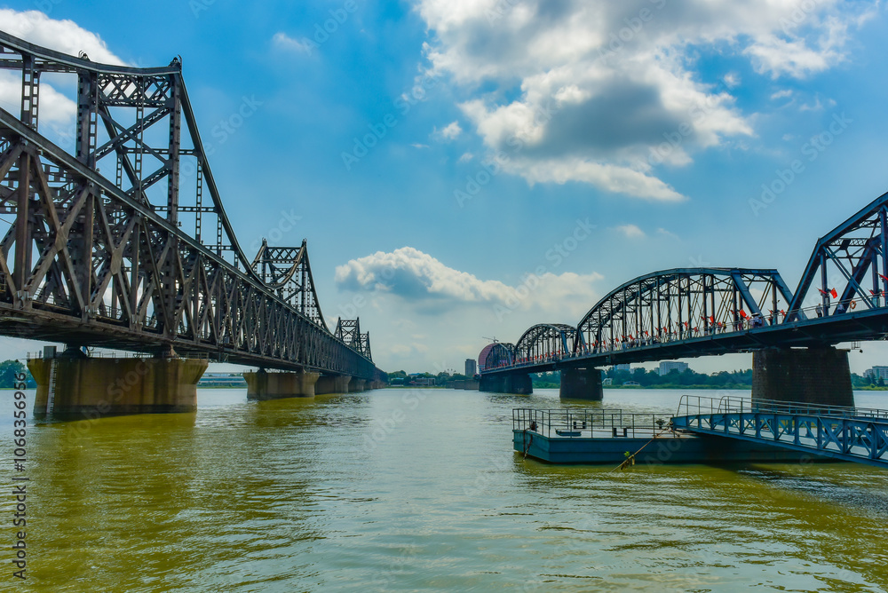 The steel bridge connecting the Yalu River in China to North Korea The steel bridge connecting the Yalu River in China to North Korea