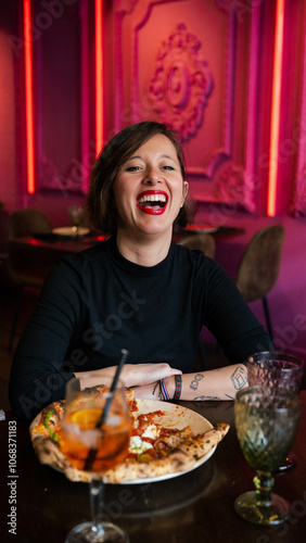 girl laughing in a restaurant