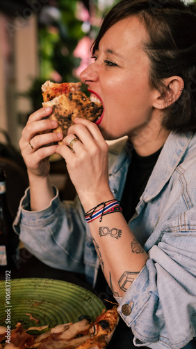 girl eating pizza in funny attitude