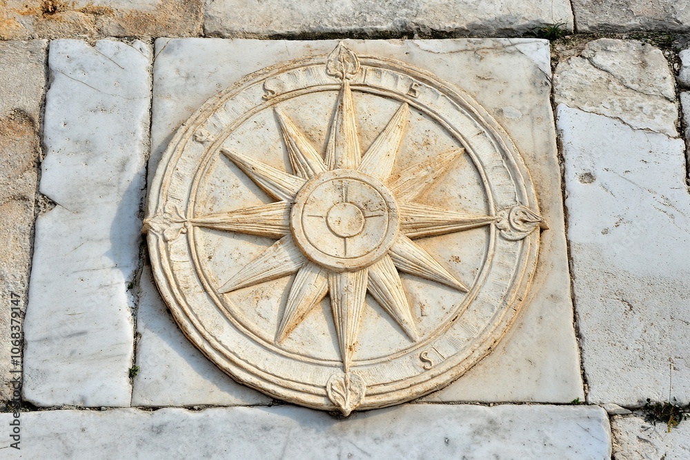 beautiful sundial sculpted in a marble slab. vernal equinox. beautiful sundial sculpted in a marble slab. vernal equinox.