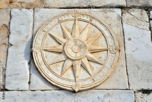 beautiful sundial sculpted in a marble slab. vernal equinox.