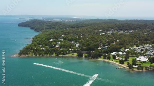 Nature reserve on Lake Macquarie Murrays beach waterfront aerial 4k flying in AU.
 photo