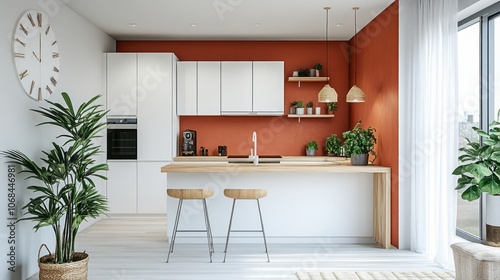 Modern kitchen with white cabinets, orange wall, and wooden accents photo