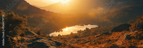 Snowdonia Sunset: The Sunlight Illuminating Llyn Gwynant amidst Wales' Scenic National Park photo