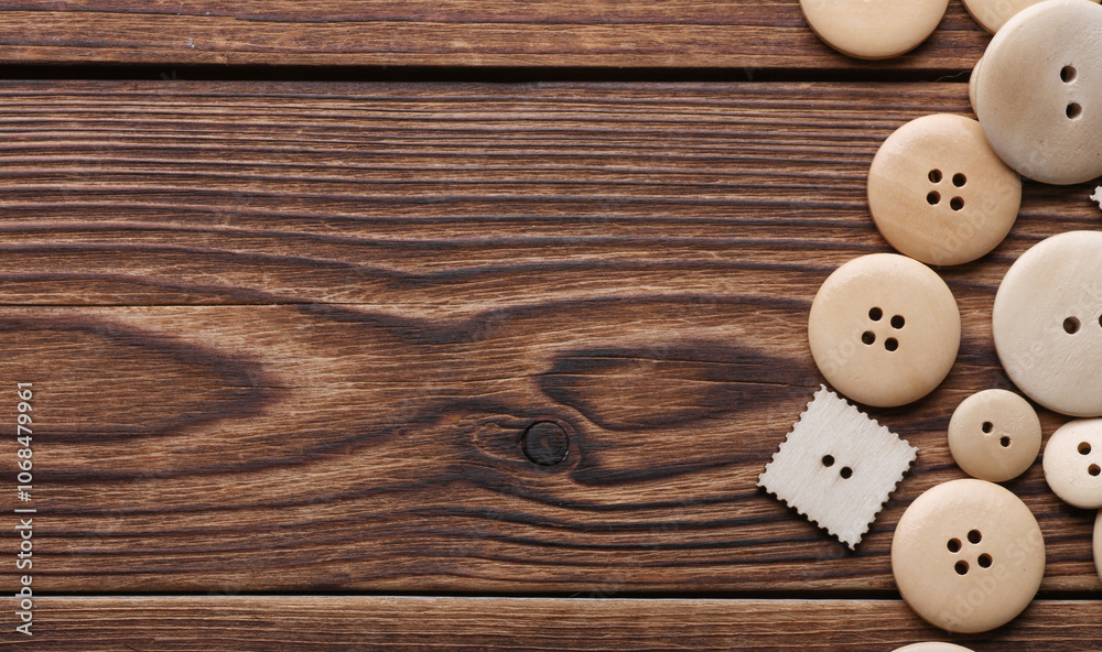 Wooden buttons on a wooden background Wooden buttons on a wooden background