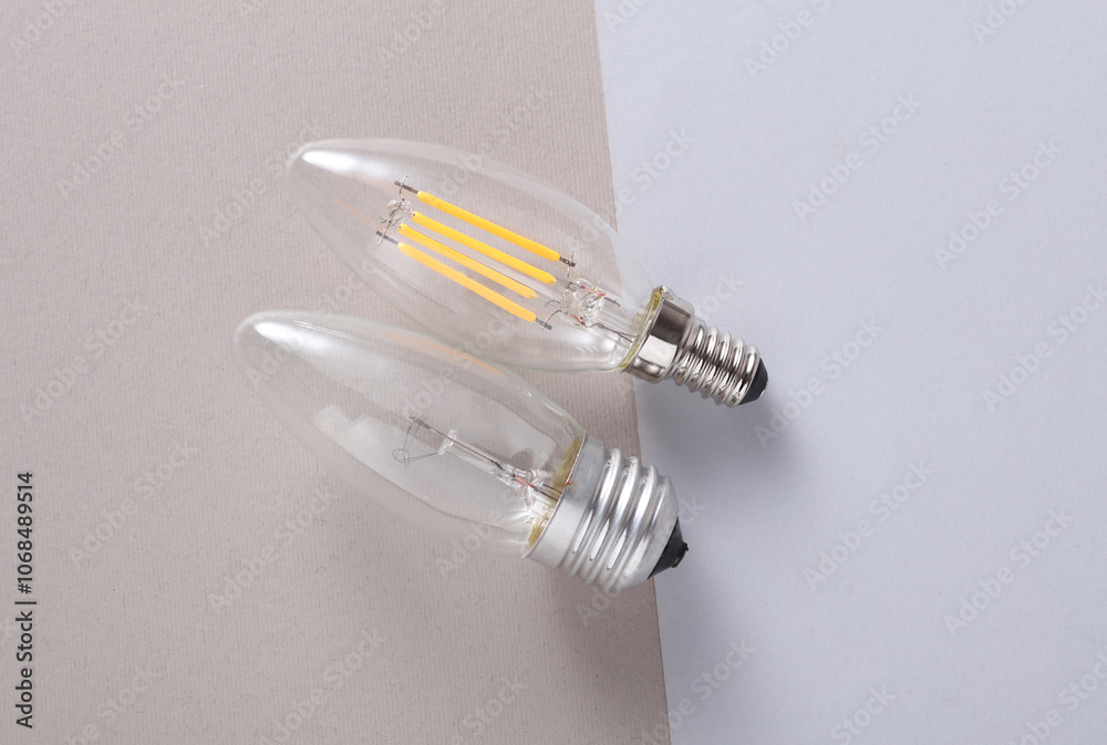 Energy Saving Filament Light Bulbs on gray Background Energy Saving Filament Light Bulbs on gray Background