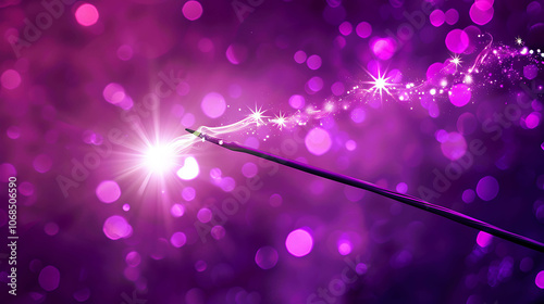 A beautiful purple background with a magic wand in the center. The wand is surrounded by a magical glow and stars. photo