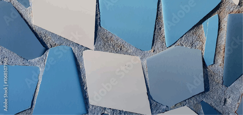 Wall made of pieces of broken tiles. Broken tiles background. Mosaic tiles. Pattern of tile pieces. Blue-white background. Mosaic texture. Interior design, renovation.