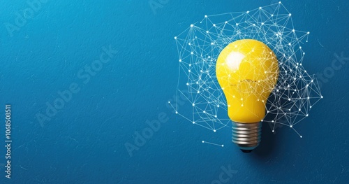 A yellow bulb in a spider web on a blue background