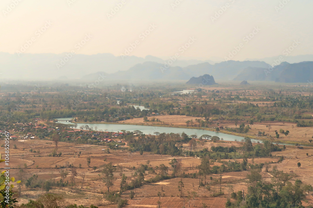 Spectacular view onto Ban Namsanam, a small village, town close to Ba Hin, another small village, town on the Thakhek Motorbike Loop, Laos Spectacular view onto Ban Namsanam, a small village, town close to Ba Hin, another small village, town on the Thakhek Motorbike Loop, Laos