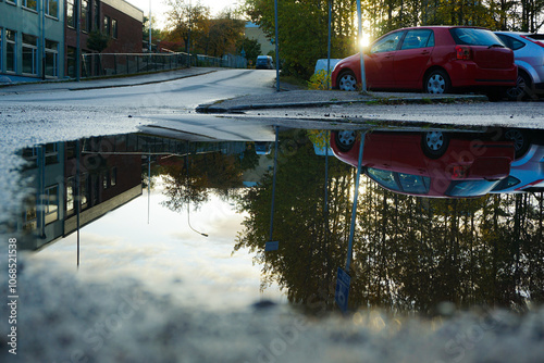 Close up of a puddle of water at a parking lot
