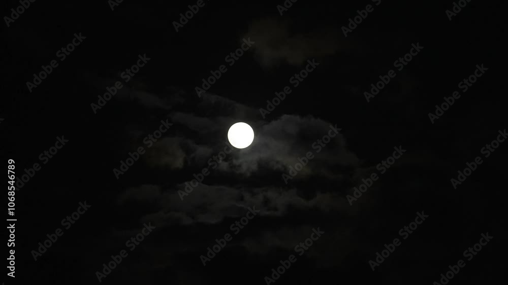 First-quarter moon (half moon) burns through strangely hued evening clouds soaked by greenish-brown sunlight diffused by off-screen rain squalls. First-quarter moon (half moon) burns through strangely hued evening clouds soaked by greenish-brown sunlight diffused by off-screen rain squalls.
