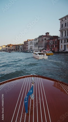 A romantic boat ride through the lagoon and canals of Venice, Italy at sunset