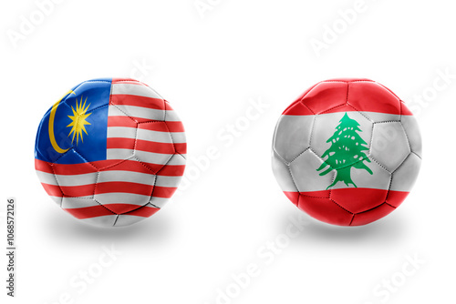 football balls with national flags of lebanon and malaysia ,soccer teams. on the white background. photo