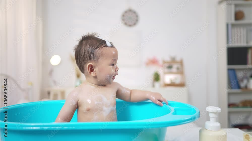 When mom gives the baby a bath, he enjoys it When mom gives the baby a bath, he enjoys it