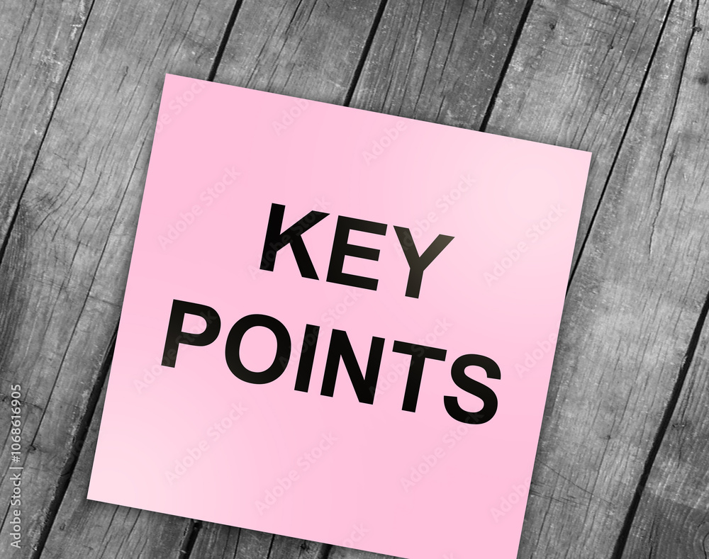 The word key points on yellow sticky note paper. The key points of an issue in business or education The word key points on yellow sticky note paper. The key points of an issue in business or education